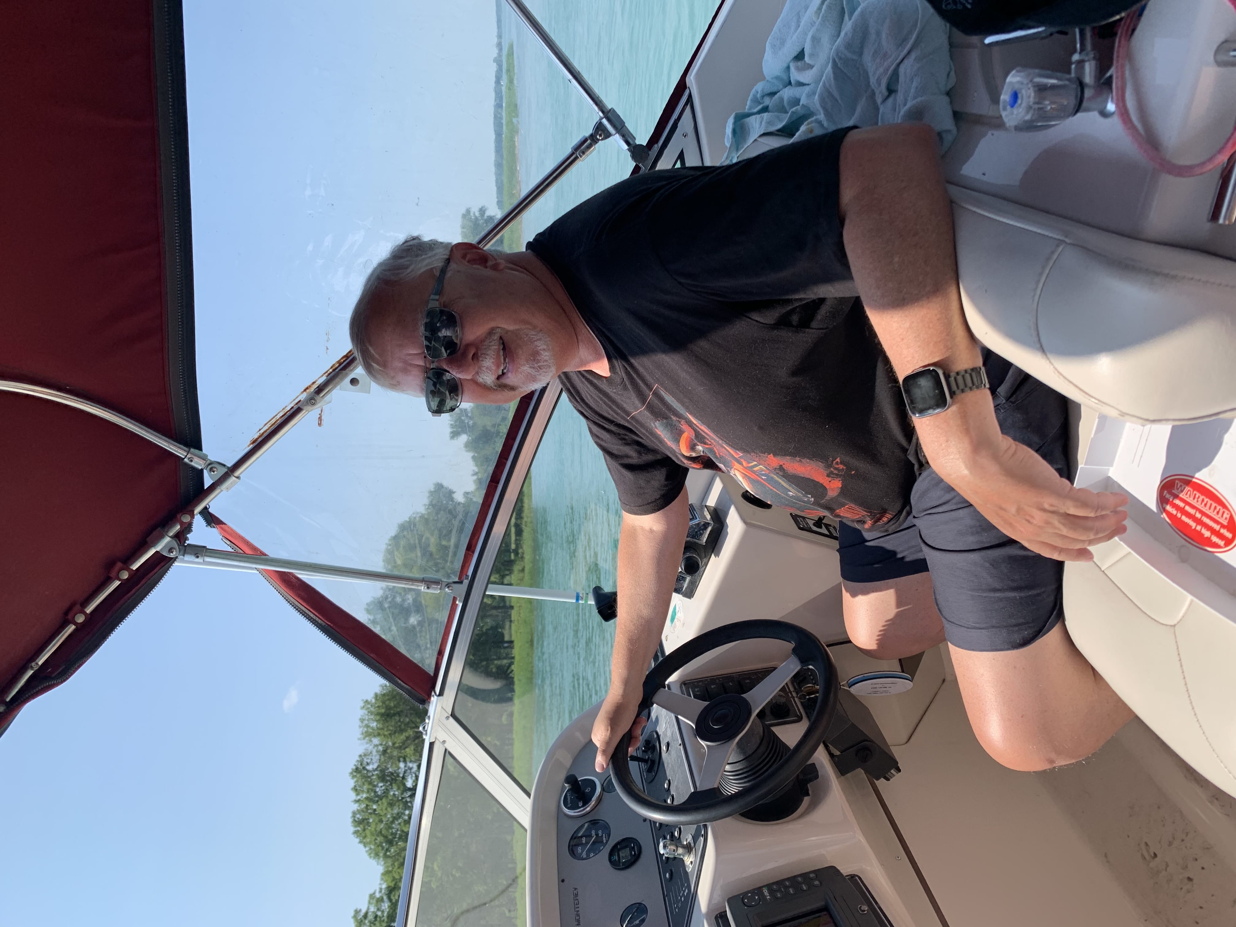 Skipper Don at the helm on Lake Erie
